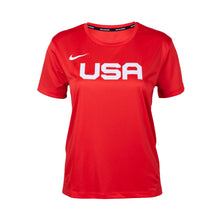 A red Nike Team USA women's short sleeve miler top with white text 'USA' on the chest and a white swoosh on the right chest.
