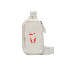 White sling bag with red logo on a white background