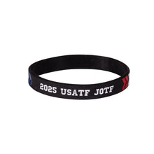 Black wristband with '2025 USATF JOTF' text on a white background