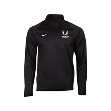 Black long-sleeve athletic shirt with Nike and USATF logos on a white background